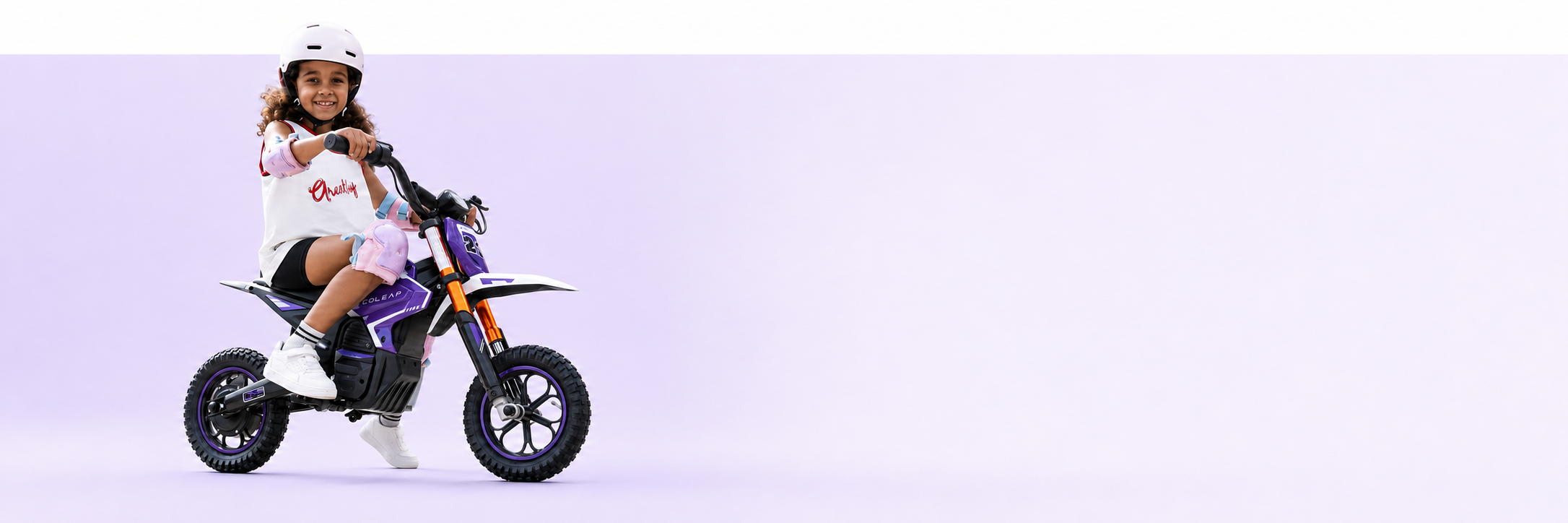 Young rider enjoying the purple Ecoleap K2 kids electric dirt bike